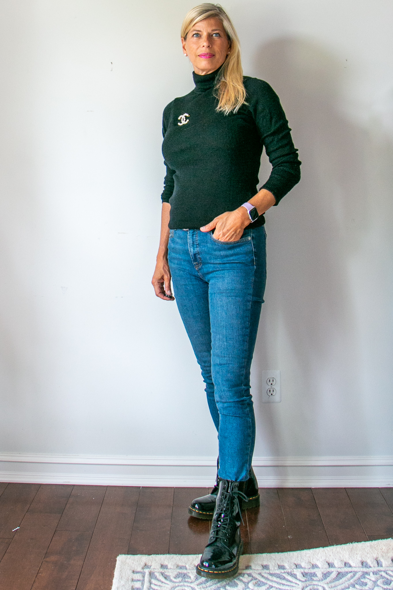 Black turtleneck sweater skinny jeans with boots