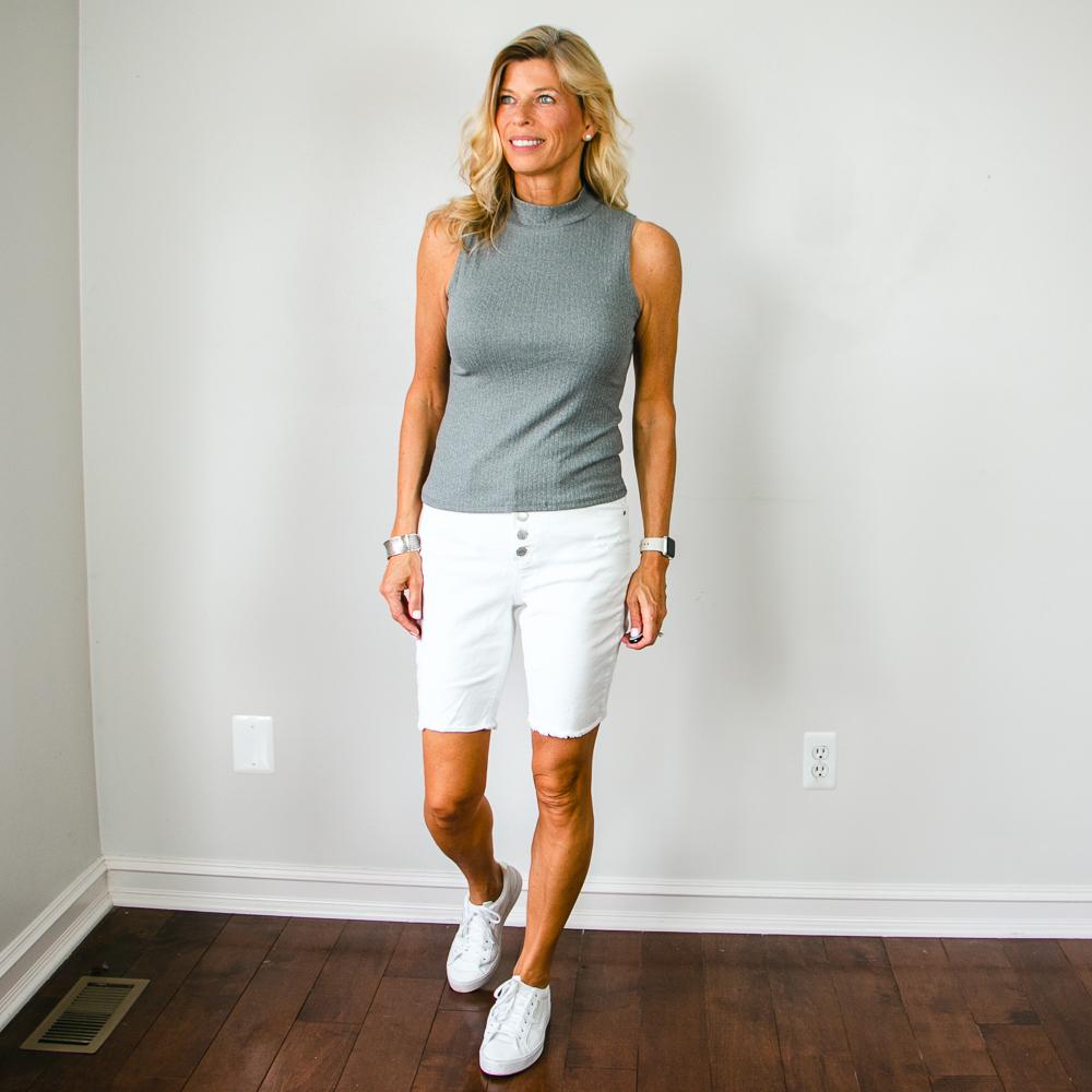 White Distressed Bermuda Shorts with Button Fly and Grey Sleeveless Mock Turtleneck Shirt