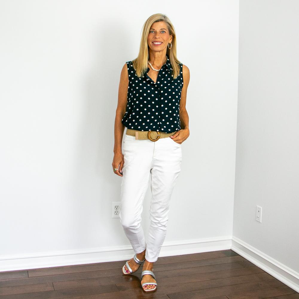 Navy Polka Dot Sleeveless Blouse Outfit with White Jeans