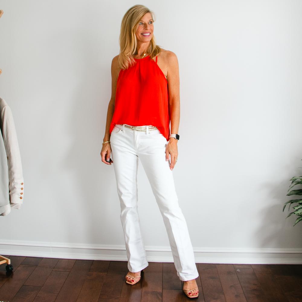 orange halter tank top with white jeans outfit