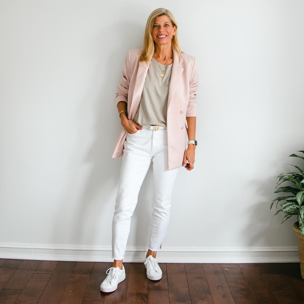 pink blazer outfit with white tapered jeans