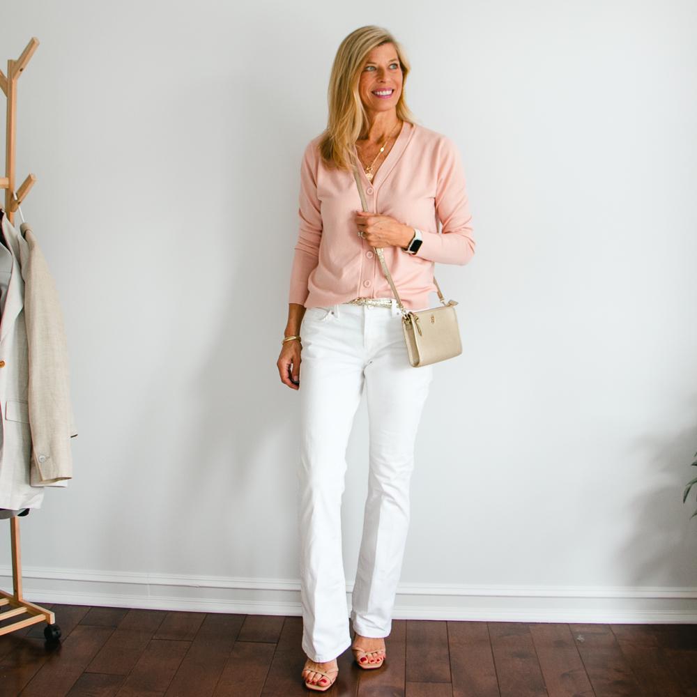pink cardigan sweater & white jeans outfit with gold accessories